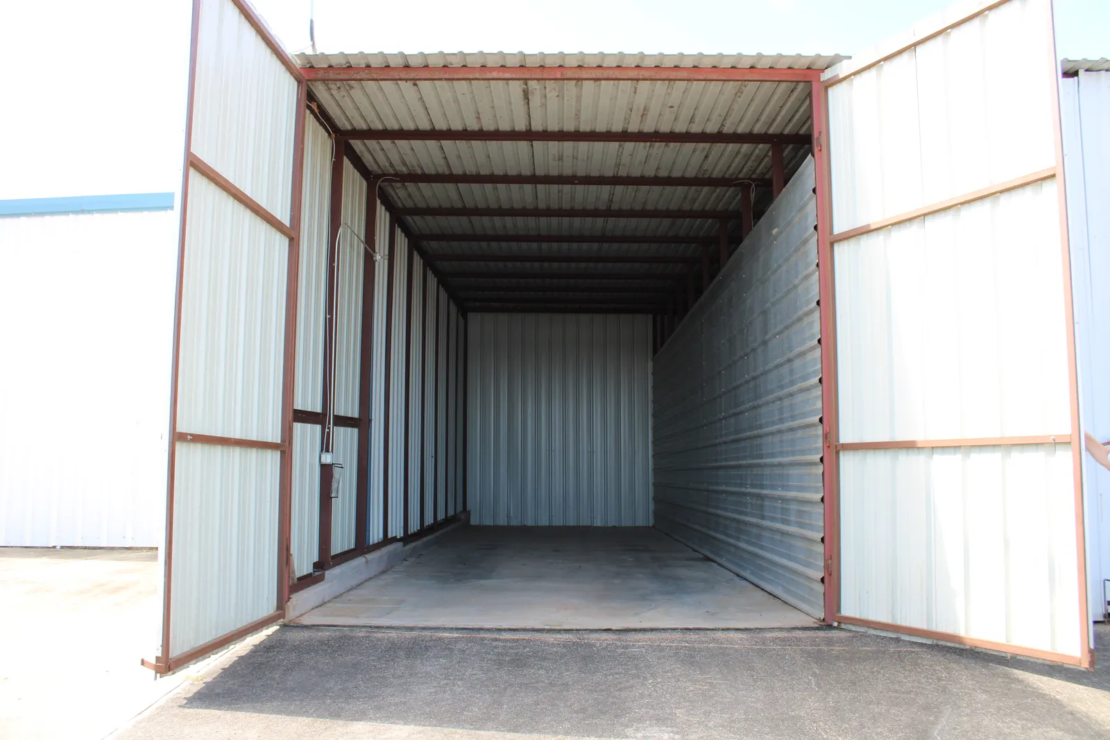 An open enclosed dry storage stall at The Palms Marina