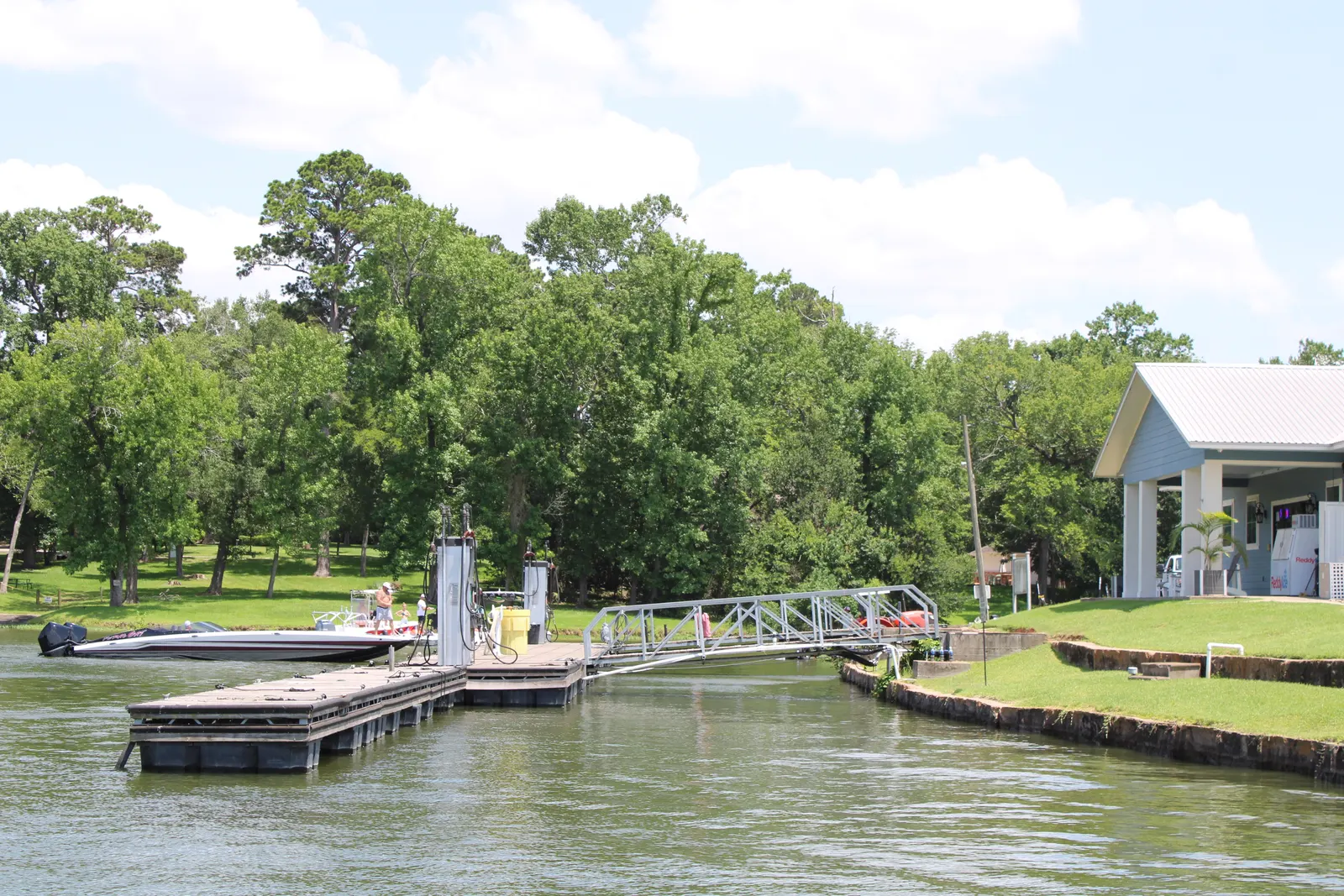 The on-the-water fuel dock and pump at The Palms Marina on Lake Conroe