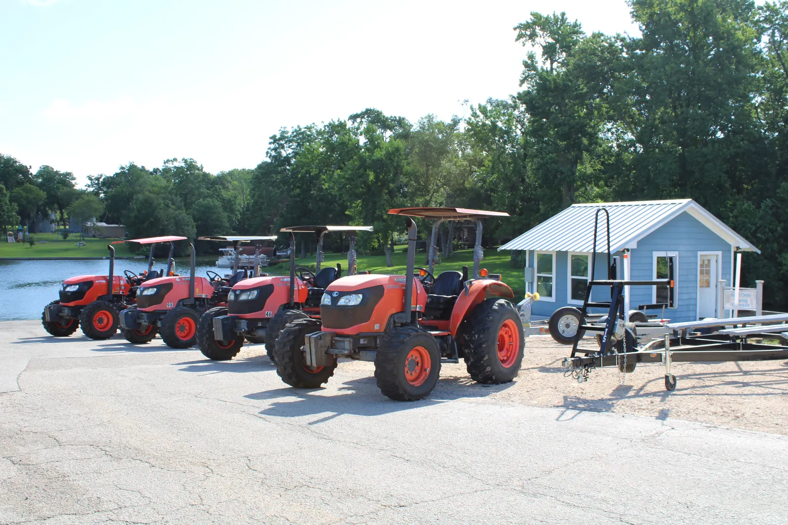 The fleet of valet launch tractors at The Palms Marina
